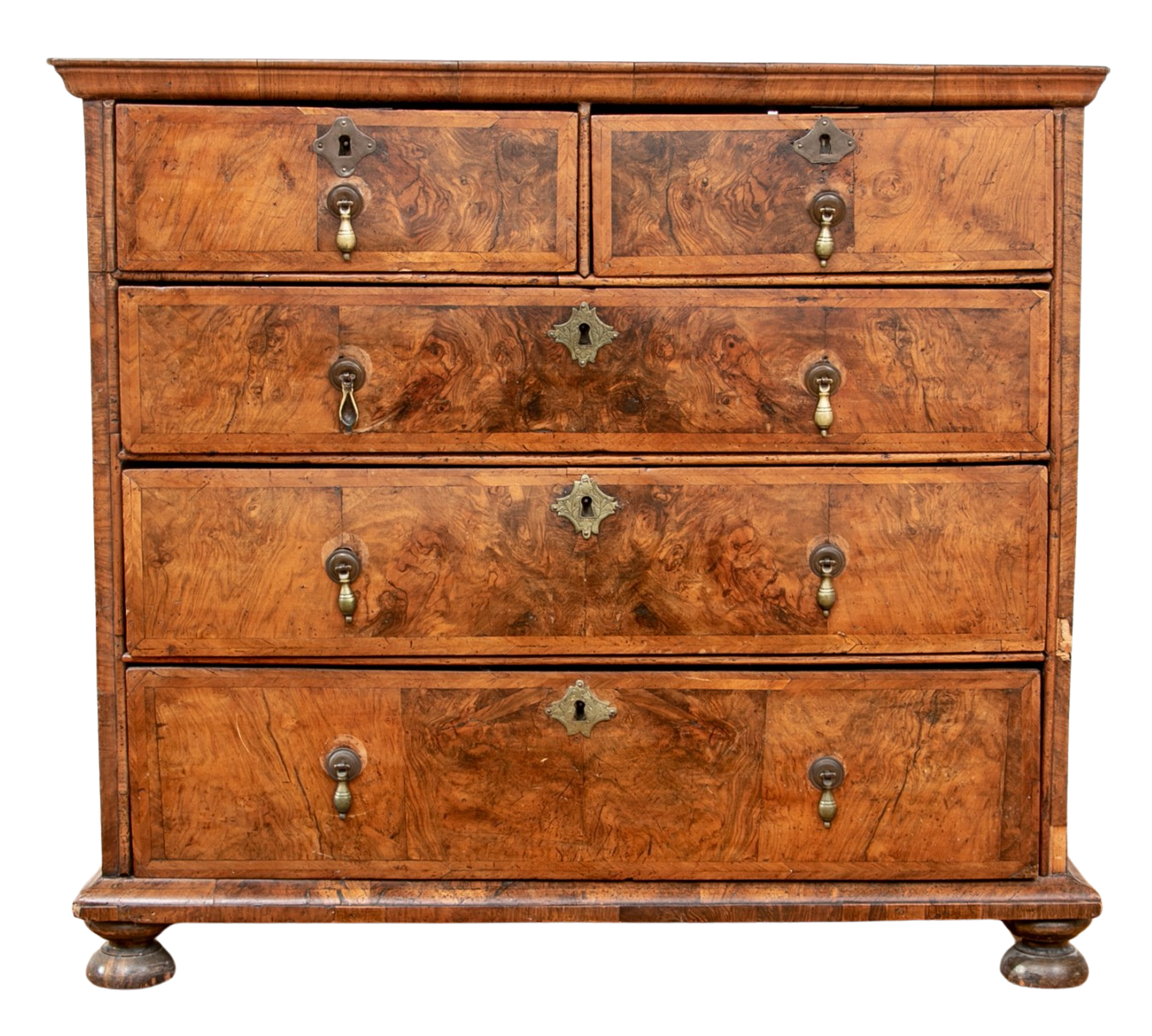 An 18th century antique William and Mary cross-banded burred walnut chest of drawers with brass drop pulls and escutcheons